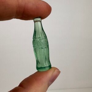 Lot of 7 Miniature Small Celluloid Coca Cola Coke Bottle Clear Green Embossed